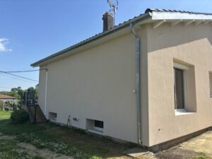 Maison rénovée par AD VALIDEM, mettant l'accent sur la rénovation énergétique.