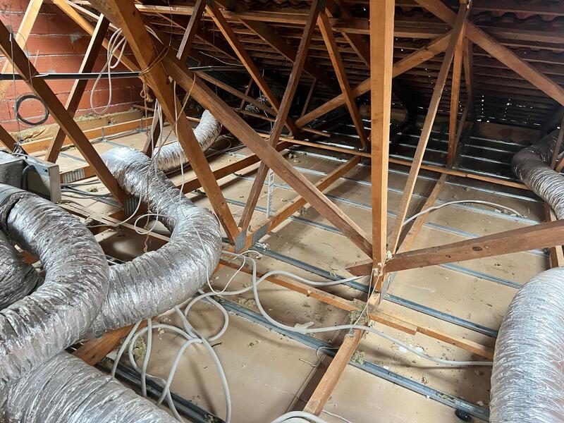 Travaux de rénovation énergétique par AD VALIDEM dans un réseau de gaines.